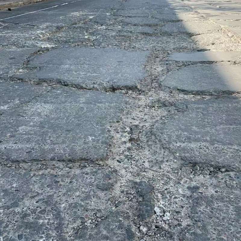 游仙路面起砂露石子修补料